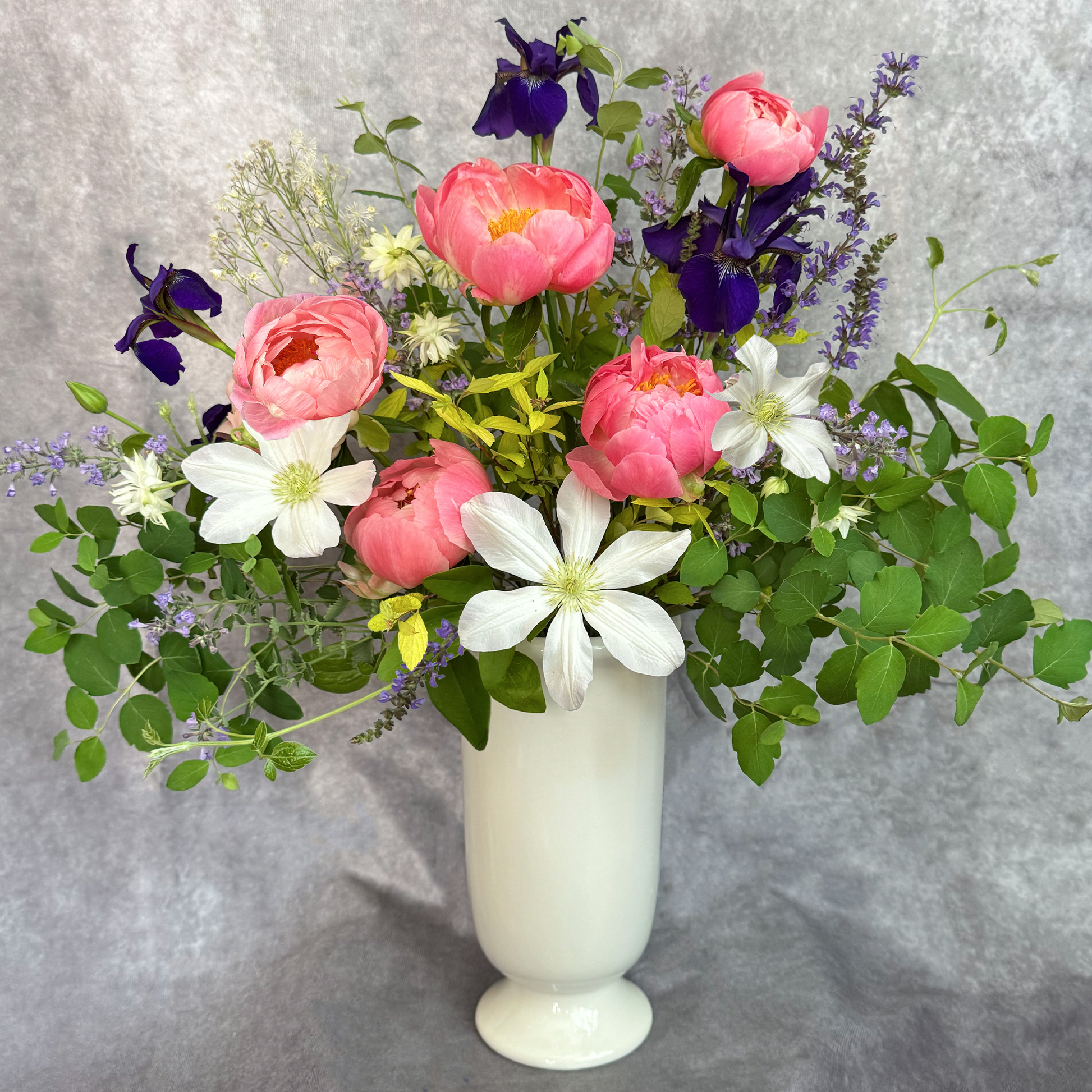 Bouquet of flowers in a white vase