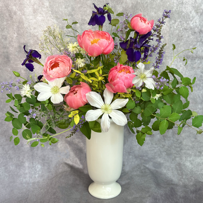 Bouquet of flowers in a white vase